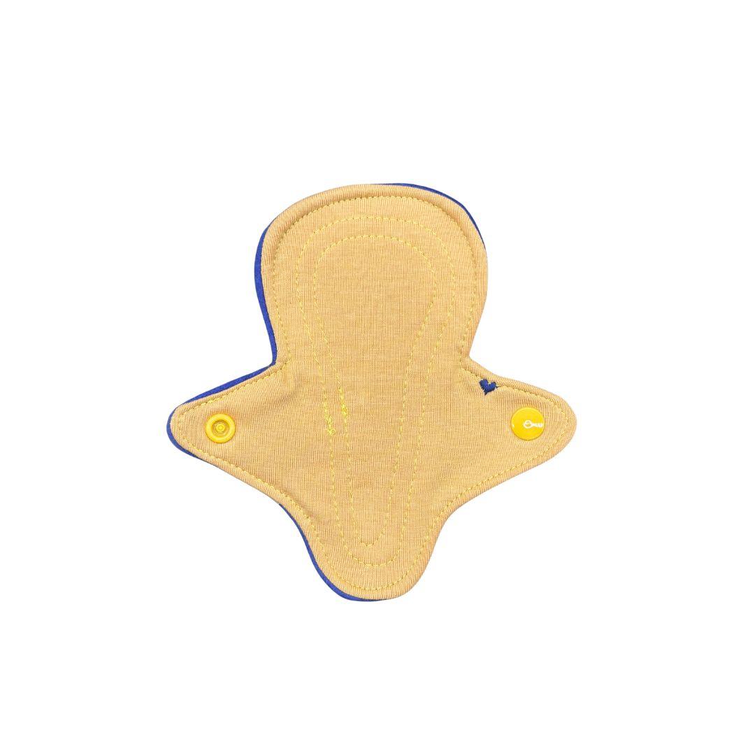 Herbruikbaar inlegkruisje string tricot okergeel - LottePads